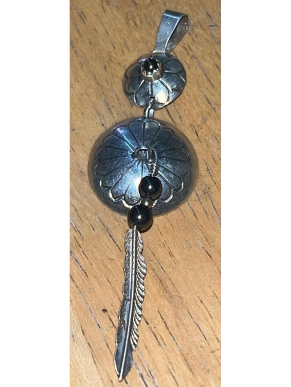 Native American Navajo jewelry handmade sterling silver feather pendant